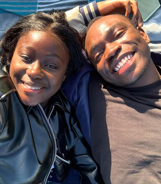 Big smiles, faces side by side